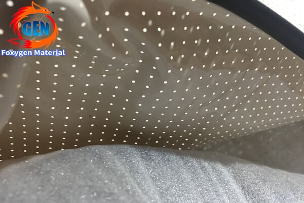 Stretched fabric acoustic ceiling showing deep air cavity and absorbent backing